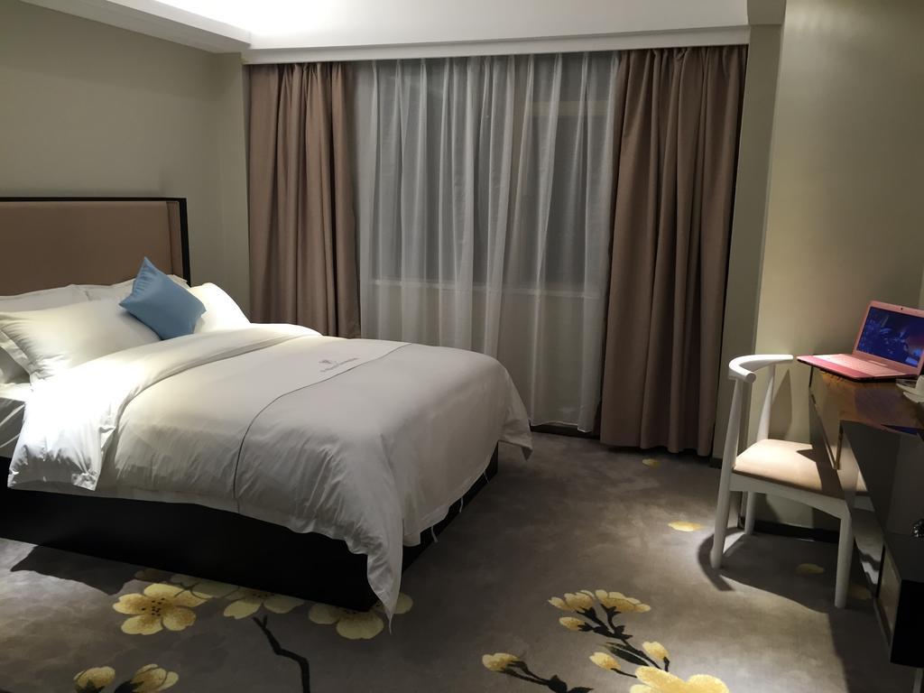 Insail Hotels Zhujiang New Town Jinan University Branch Cantão Quarto foto