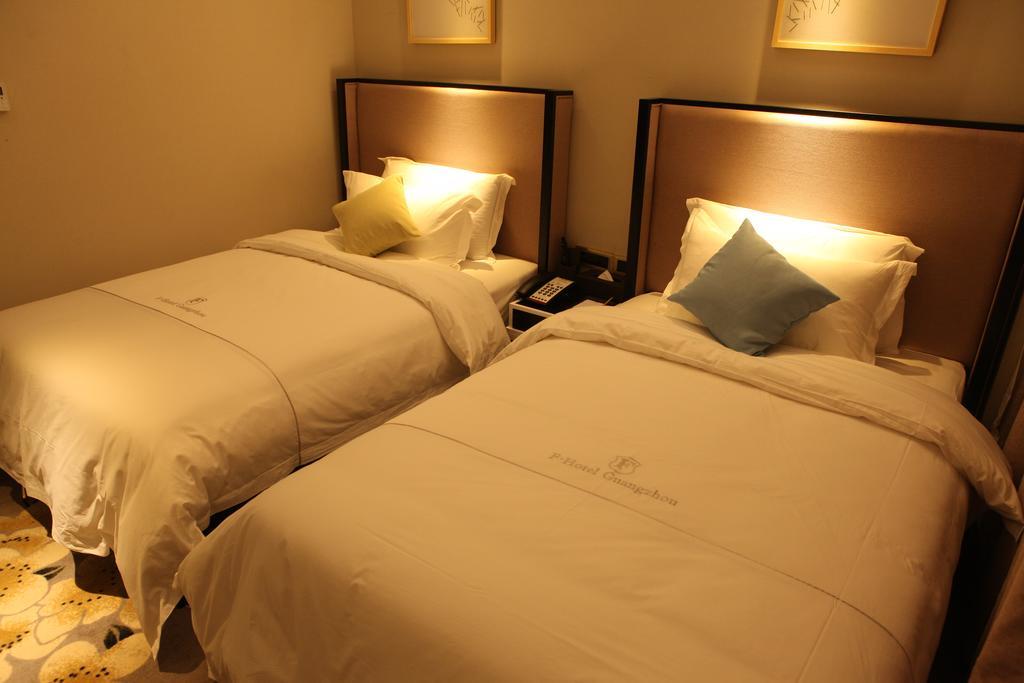Insail Hotels Zhujiang New Town Jinan University Branch Cantão Quarto foto